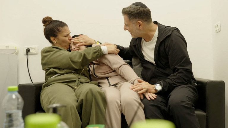 Daniella Gilboa is embraced by her parents. Pic: IDF via Reuters