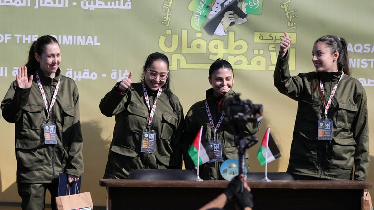 Four female soldiers reunite with families in Israel – as freed Palestinian prisoners carried by huge crowds in West Bank Four female soldiers reunite with families in Israel – as freed Palestinian prisoners carried by huge crowds in West Bank