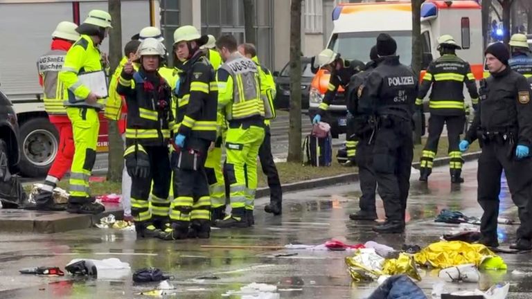 Emergency services attend the scene of an accident after a driver hit a group of people in Munich, Germany, Thursday Feb. 13, 2025. (Peter Kneffel/dpa via AP)