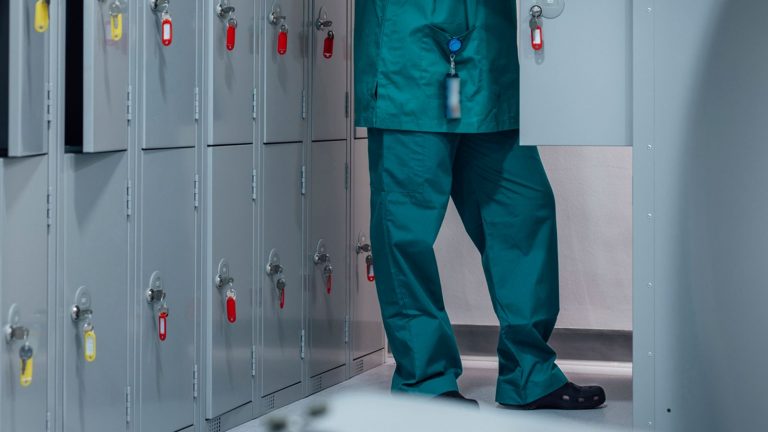 Nurse who objected to transgender doctor in changing room admits 'harassment'