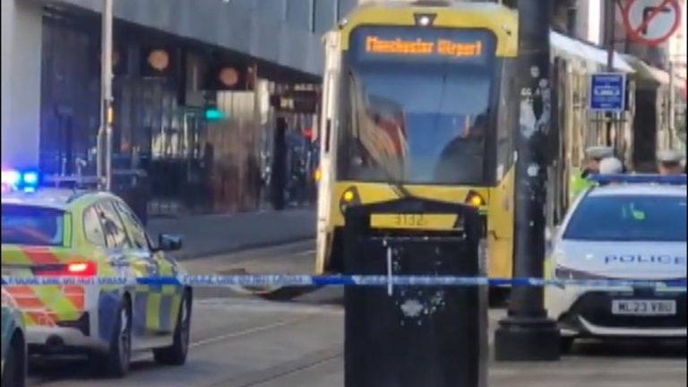 Police hunt van driver after girl, 3, dies in Manchester tram collision