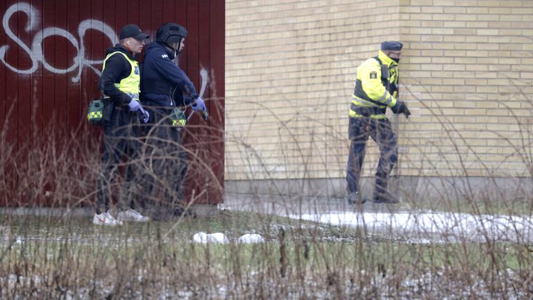 Police at the scene of a shooting at Risbergska School, in Orebro, Sweden 
Pic: Kicki Nilsson/TT News Agency/AP