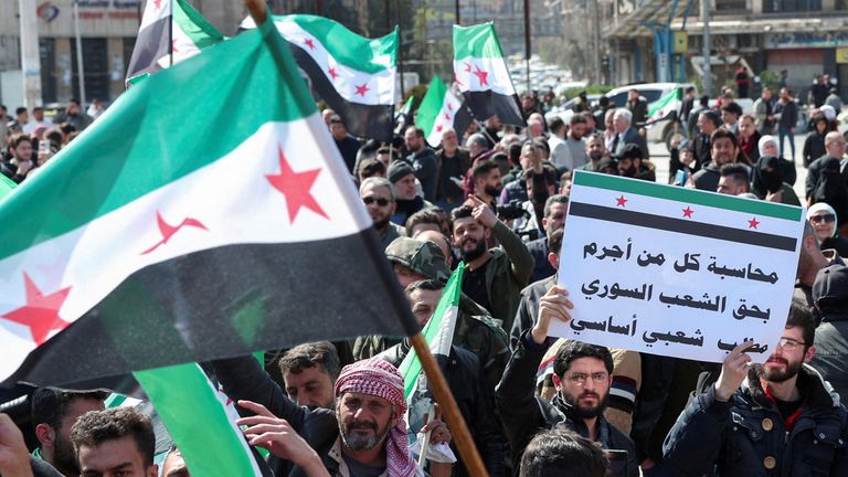 Syrians demonstrate in support of the Syrian government, after attacks carried out by groups loyal to ousted leader Bashar al-Assad in the Latakia region, in Aleppo, Syria, March 7, 2025. REUTERS/Mahmoud Hassano TPX IMAGES OF THE DAY
