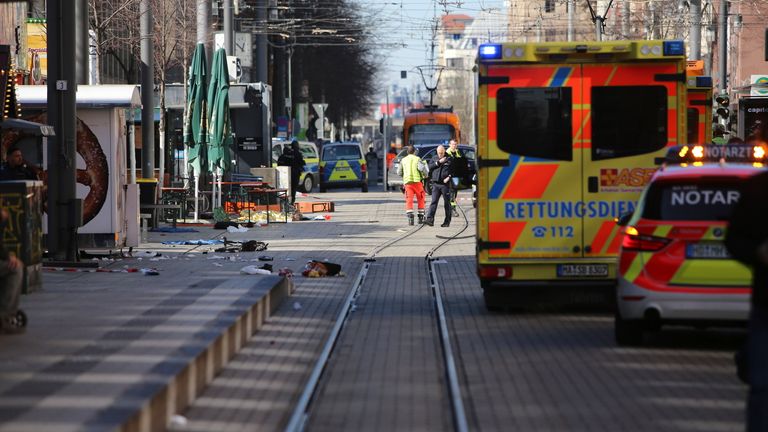Emergency services and police in Mannheim following a serious incident.
Pic: DPAA/AP