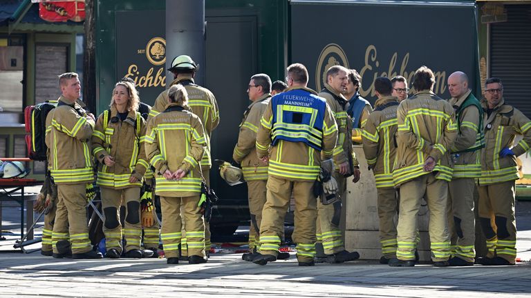 Emergency workers stand by during a major operation in the city centre of Mannheim, Germany.
Pic: DPA/AP