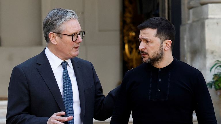 Ukraine's President Volodymyr Zelenskiy, right, walks with British Prime Minister Keir Starmer as he leaves the UK Ambassador's Residence on the day of a meeting with European leaders on strengthening support for Ukraine, in Paris, Thursday, March 27, 2025, on the sidelines of a summit for "coalition of the willing". (Stephanie Lecocq/Pool Photo via AP)