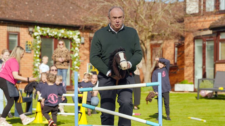 Ed Davey tries his hand at hobby horsing during the launch of the party's local election campaign in Walled Garden of Badgemore Park in Henley-on-Thames.
Pic: PA
