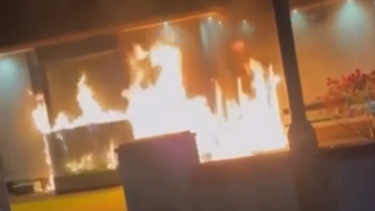 A house after it was set on fire by two individuals in Glasgow