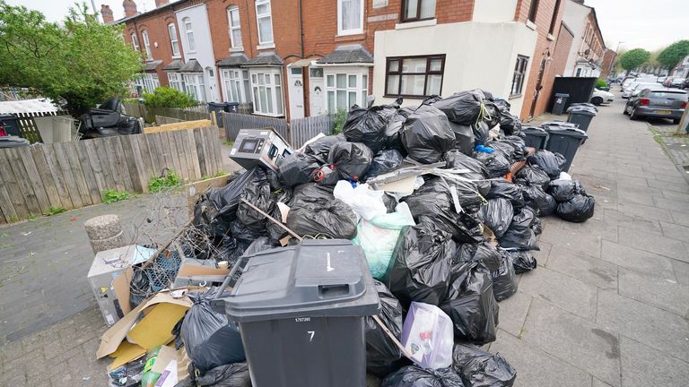 Rubbish bags in Poplar Road in Birmingham.  
Pic: PA