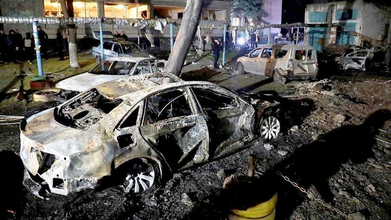Burned cars are seen next to an apartment building damaged during a Russian drone strike, amid Russia's attack on Ukraine, in Dnipro, Ukraine, in this handout picture released April 17, 2025. Press service of the State Emergency Service of Ukraine/Handout via REUTERS    THIS IMAGE HAS BEEN SUPPLIED BY A THIRD PARTY. DO NOT OBSCURE LOGO. BEST QUALITY AVALIABLE.