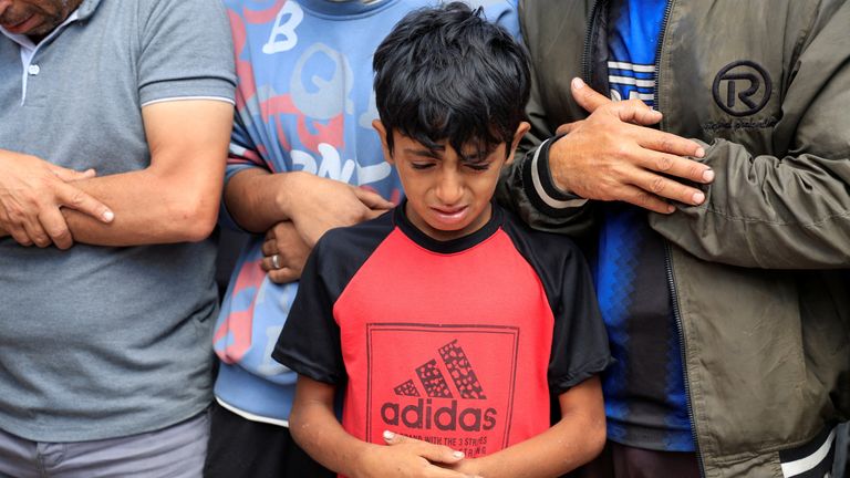 A mourner reacts during the funeral of Palestinians killed in alleged Israeli fire. Pic: Reuters