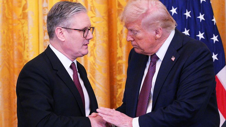 British Prime Minister Keir Starmer and U.S. President Donald Trump shake hands during a joint press conference in the East Room at the White House, February 27, 2025 in Washington, D.C., U.S. Carl Court/Pool via REUTERS